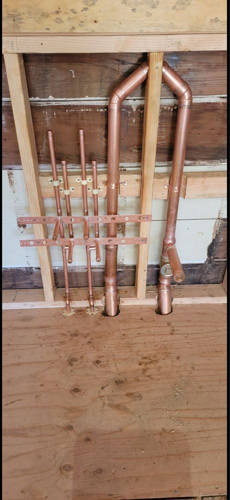 Precision-fabricated copper plumbing lines prepared by 5Star Plumbing for a Columbus repipe project